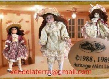 Dispongo di 3 bambole in porcellana della Heritage Mint...